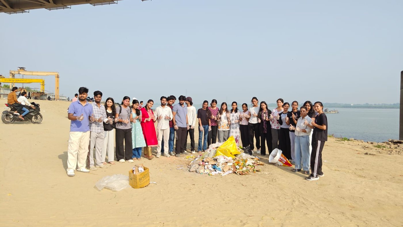 Volunteers after a riverbank cleanliness drive